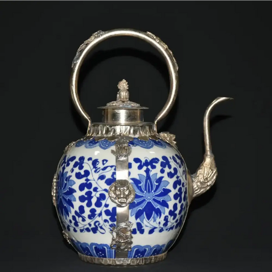 Antique blue porcelain teapot with hand-painted floral design