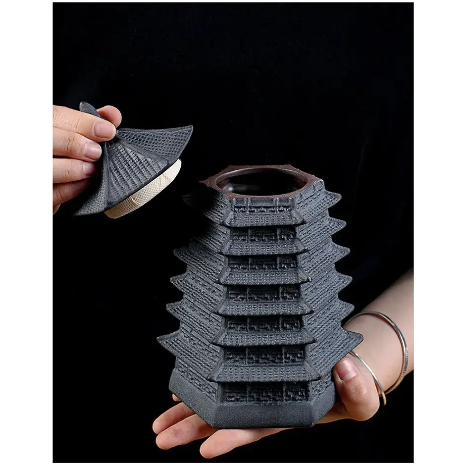 Top view of black ceramic tea canister showing opening diameter for loose leaf scooping