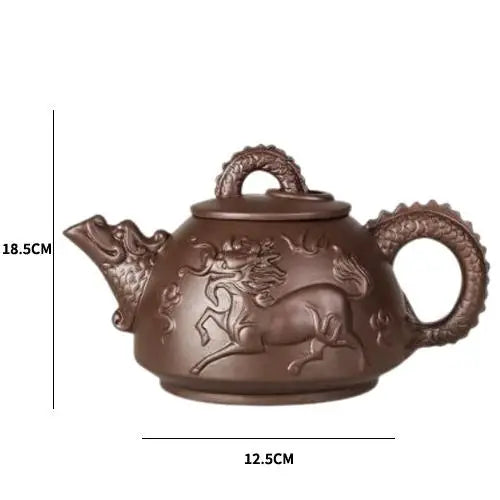 Yixing teapot with lid and cup