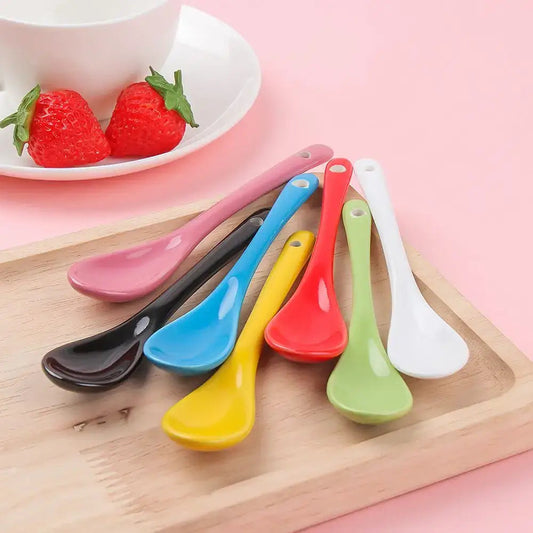 Close-up of ceramic tea spoon with long handle