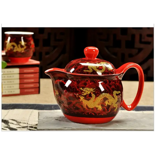 Red ceramic dragon teapot with built-in strainer