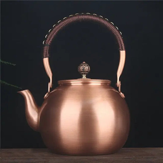 Chinese copper teapot 1.5L handcrafted round belly showing natural copper surface