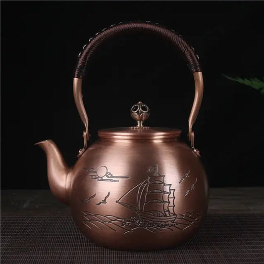 Hand-etched sailboat engraving detail on Chinese copper teapot 1.5L