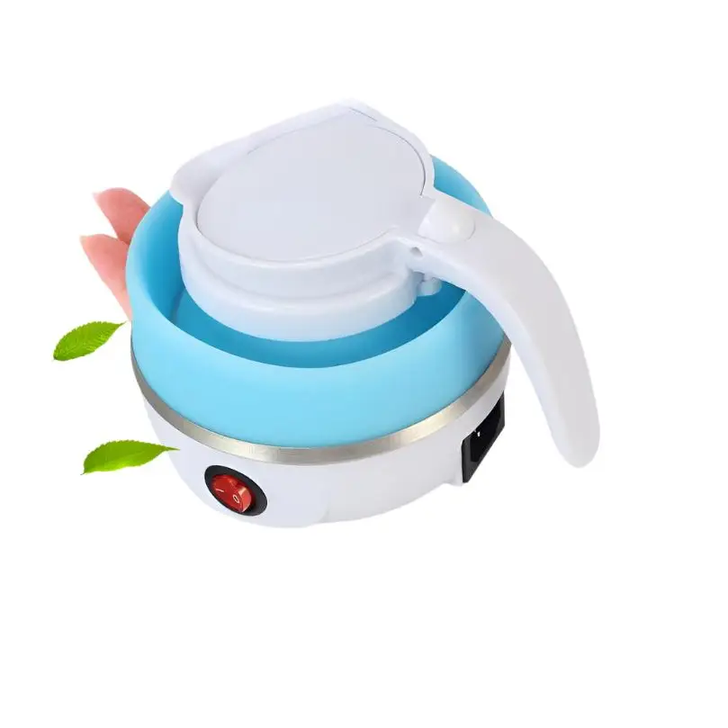 Electric kettle for quick hot water next to a steaming cup of tea