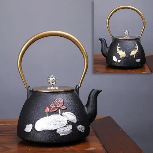 Black cast iron teapot with lotus motif