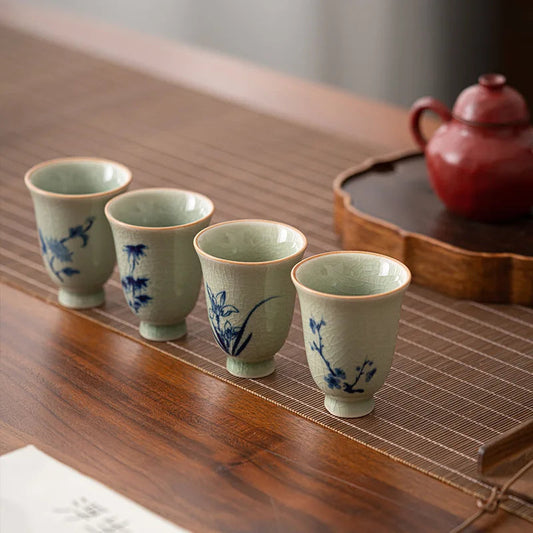 Hand-painted chrysanthemum porcelain tea cup from the Four Gentlemen set close-up