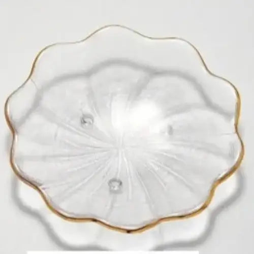 Hand-blown glass saucer for teacups on a wooden table
