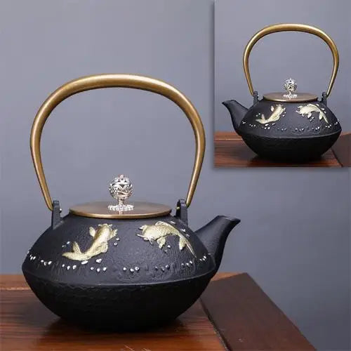 Golden carp motif on black enameled cast iron teapot