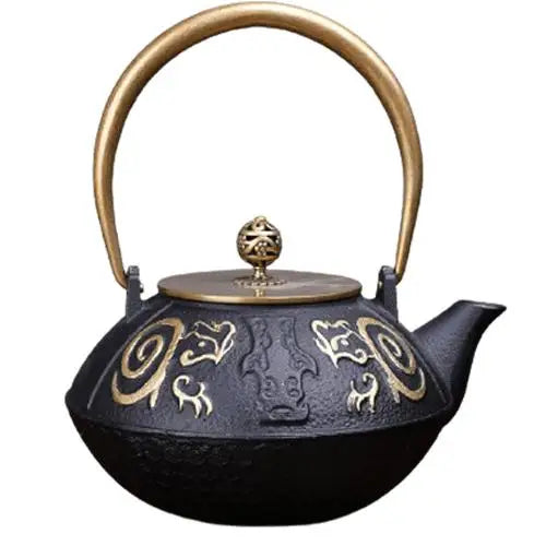 Golden royal cast iron teapot with enameled interior