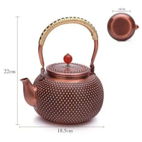 Size comparison of enameled copper teapot