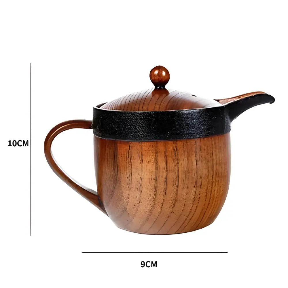 Size reference of small 350 ml jujube wood teapot next to hand