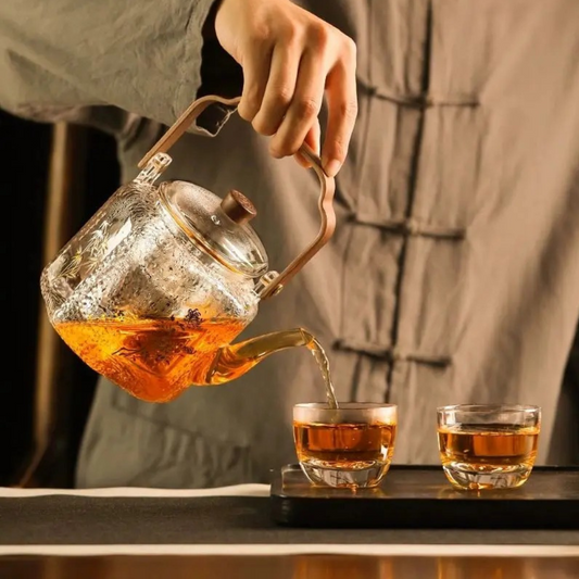 Glass teapot set with two matching cups, transparent version, full view