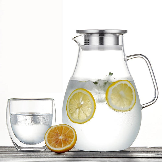 Borosilicate glass teapot with stainless steel lid and loose leaf tea inside