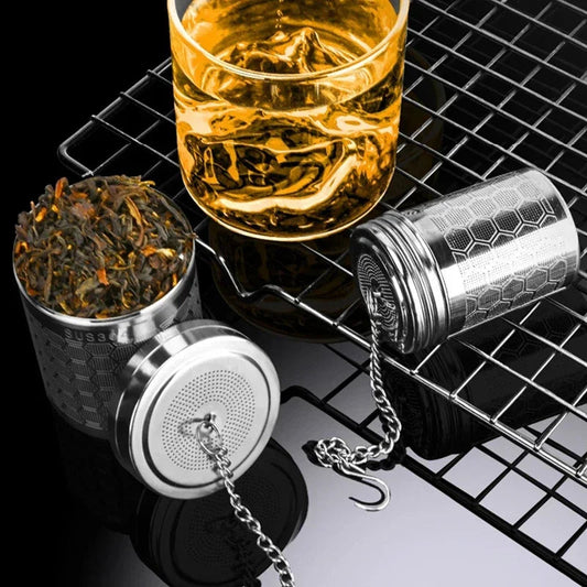 Close-up of fine mesh holes on large stainless steel tea strainer