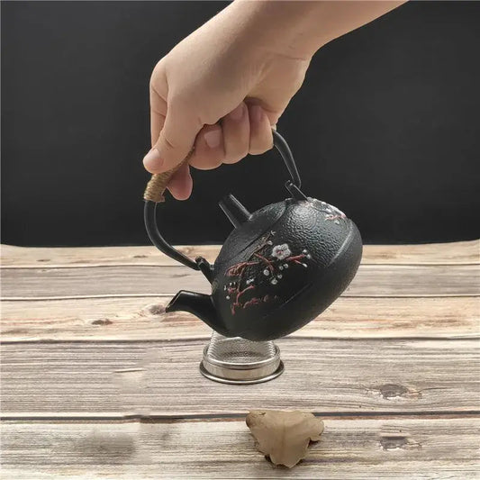 Mini cast iron teapot with traditional Chinese design