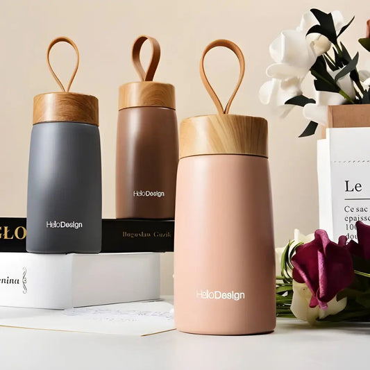 Three Nordic insulated tea bottles in rose green and gray
