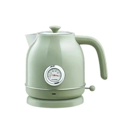 Close-up of retro green electric kettle spout and handle