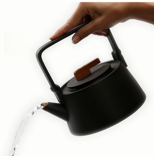 Nordic hygge teapot in white ceramic with matte finish, front view