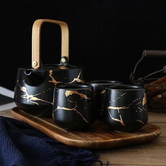 Scandinavian porcelain teapot 1L in White and Gold finish, side view