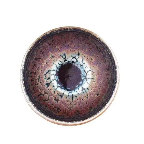 Tenmoku chawan dark iron-spot glaze close-up handcrafted matcha bowl