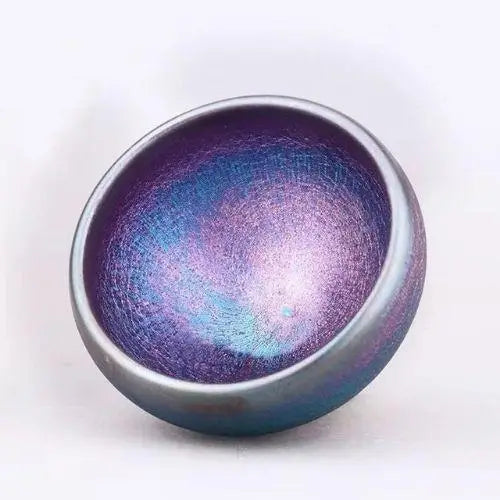 Granny Lulu handmade Tenmoku matcha bowl iron-glaze finish close-up, stoneware ceramic