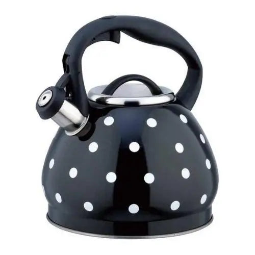 Black polka dot stainless steel whistling kettle on gas stovetop with steam rising