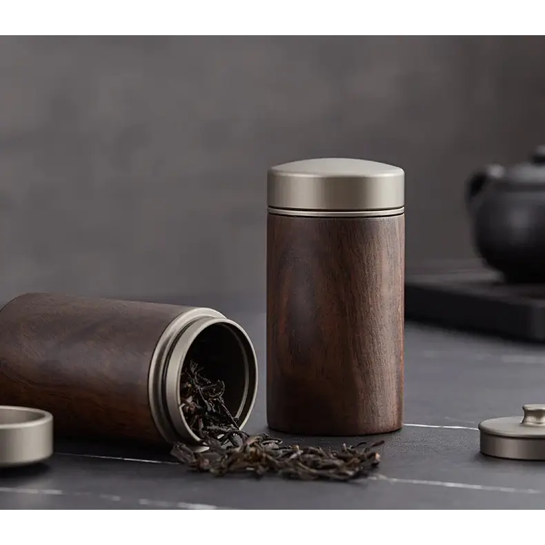 Decorative wooden tea caddy displayed on a kitchen shelf with tea collection