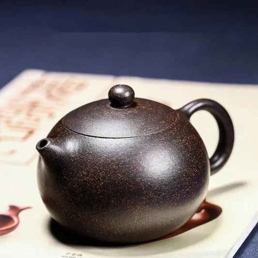 Round Yixing purple clay gongfu teapot 220ml showing natural matte finish