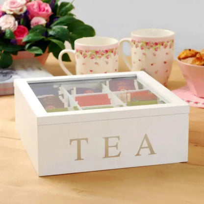 Open wooden tea bag storage box with 9 individual sections visible