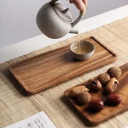 Acacia wood tea tray with a cup