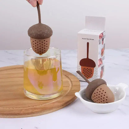 Acorn shaped tea infuser open showing tea leaves