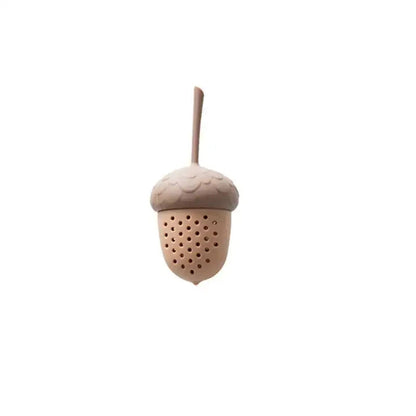 Acorn tea infuser in a tea pot with loose leaf tea