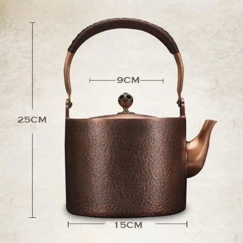 Large 2000ml copper kettle sitting on a gas stove burner