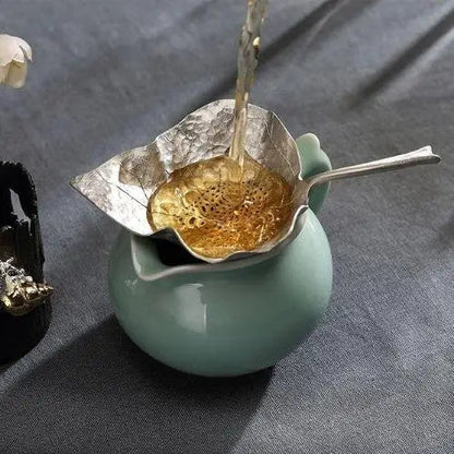 Antique tea strainer made of tin