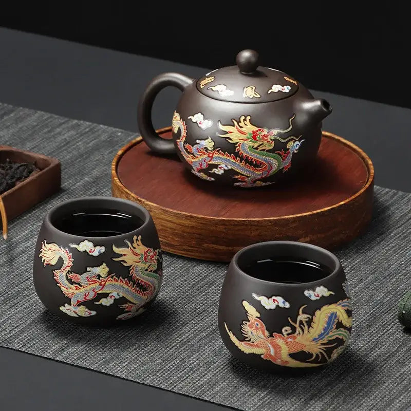 Asian ceramic teapot with dragon and phoenix design