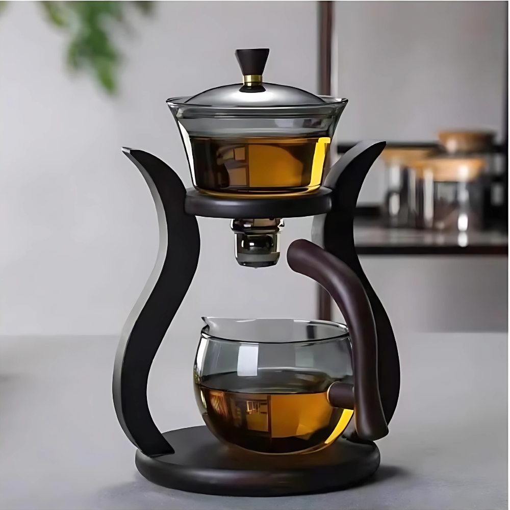 Stainless steel infuser basket and glass lid detail on automatic teapot