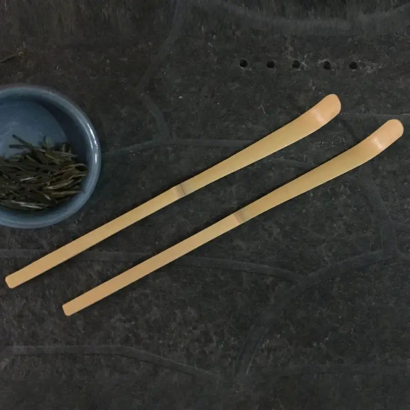Bamboo matcha scoop spoon on a wooden table