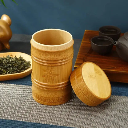 Bamboo tea canister with carved ornamental detail, lid closed