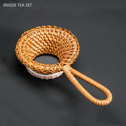 Bamboo tea strainer over a cup of tea