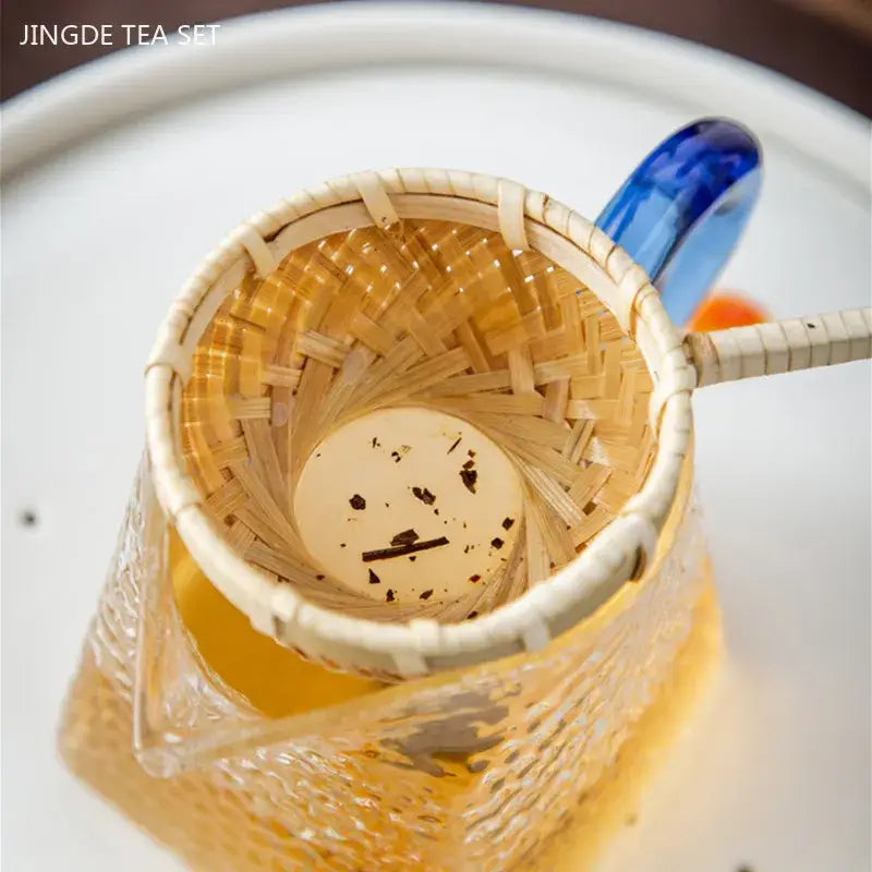 Bamboo tea strainer on a saucer