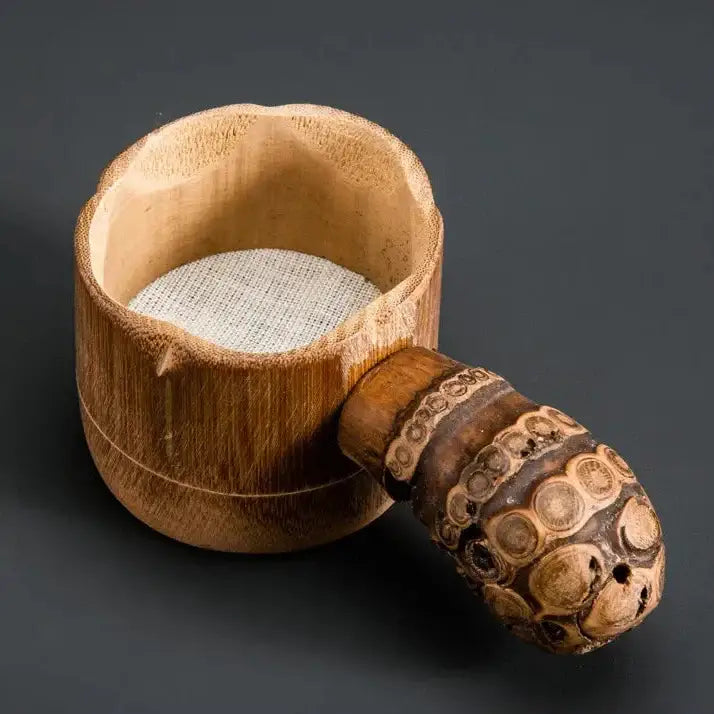Bamboo tea strainer with green tea