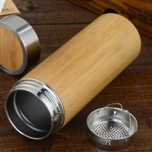 Close-up of natural bamboo wrap on insulated tea travel bottle