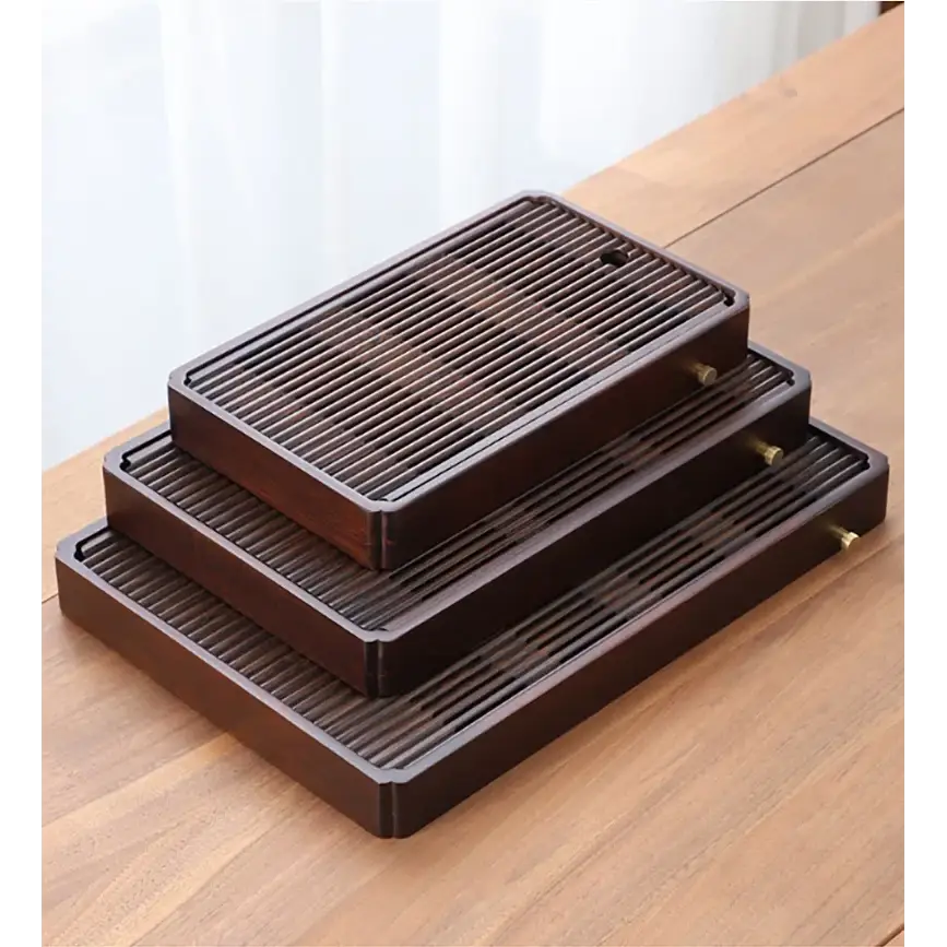 Close-up of bamboo tea tray slats and water reservoir