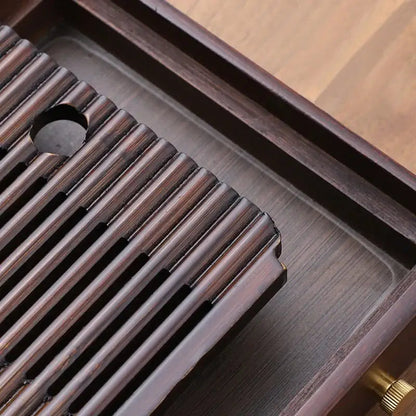 Bamboo tea tray with hidden water tray pulled out
