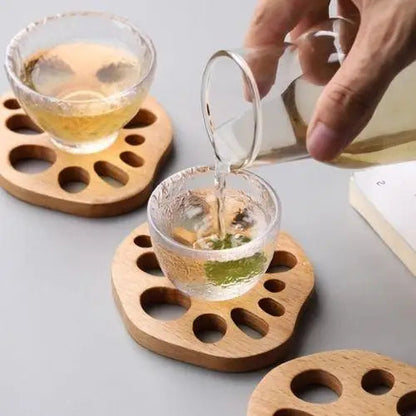 Using a beech wood tea coaster under a mug