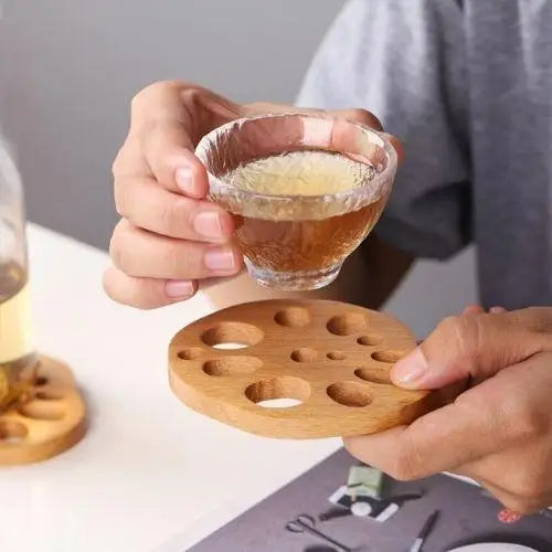 Beech wood tea coaster with a teacup of tea