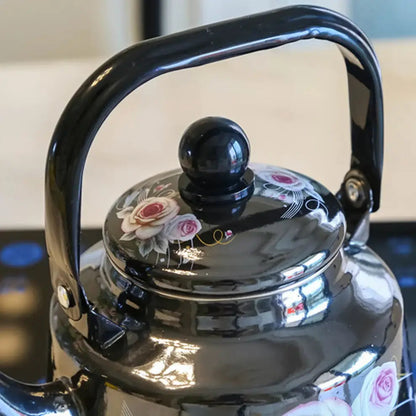Black enamel teapot on kitchen counter