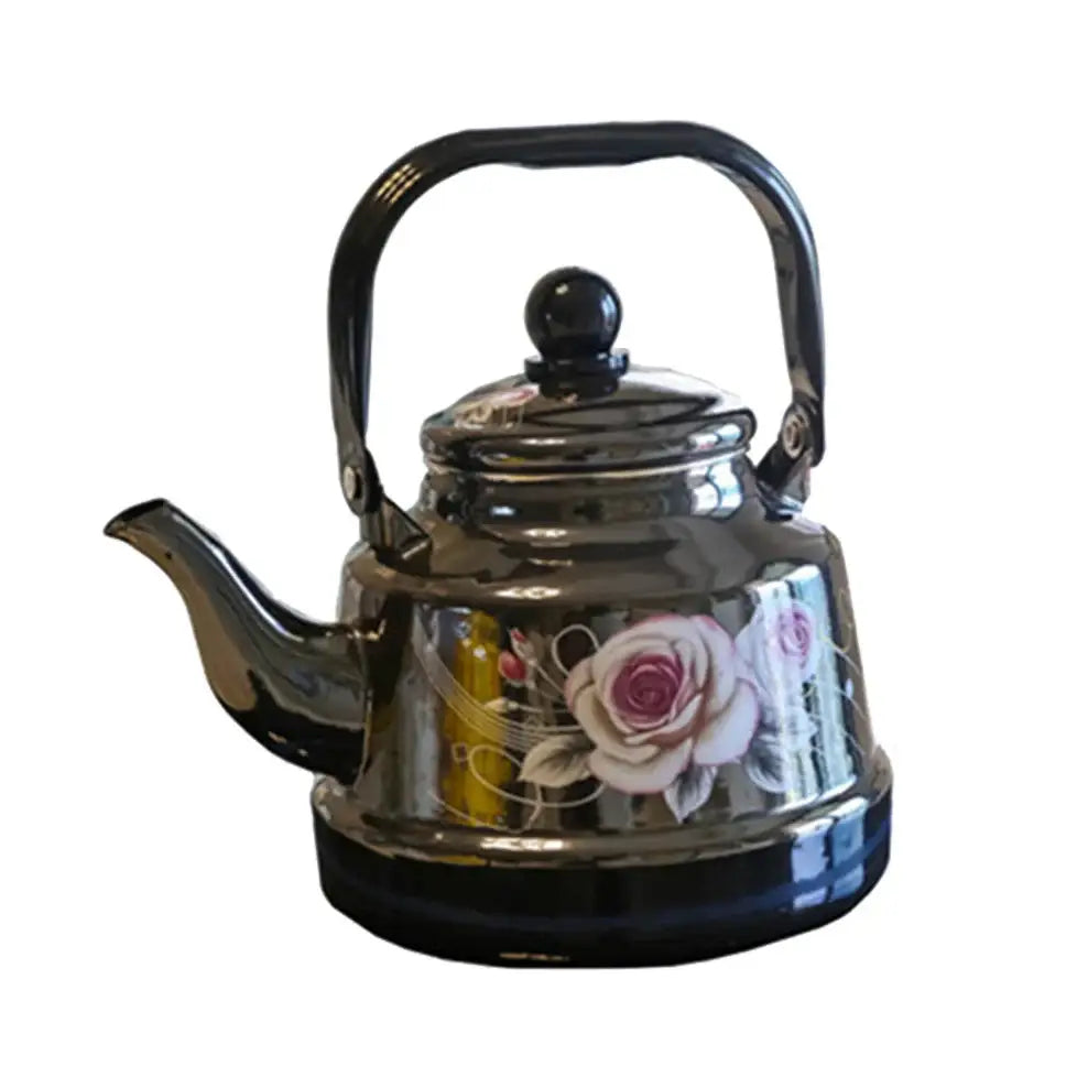Black enamel teapot pouring tea