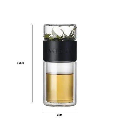 Black glass tea thermos shown next to ruler showing 16 cm height