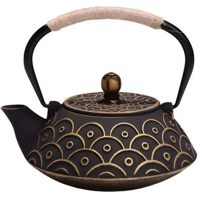 Black cast iron teapot with raised gold scale pattern, 34 oz